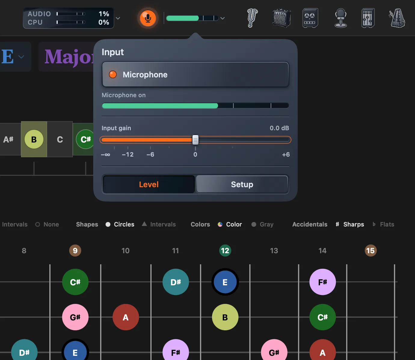 The input console open below the top bar, showing the Microphone switch, its status line, the input meter, input gain, and the Level and Setup tabs.