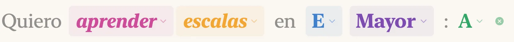 El encabezado en lenguaje natural que dice “Quiero aprender escalas en E Mayor: A”, con cada palabra cambiable dibujada como un chip de color y el chip del acorde al final.